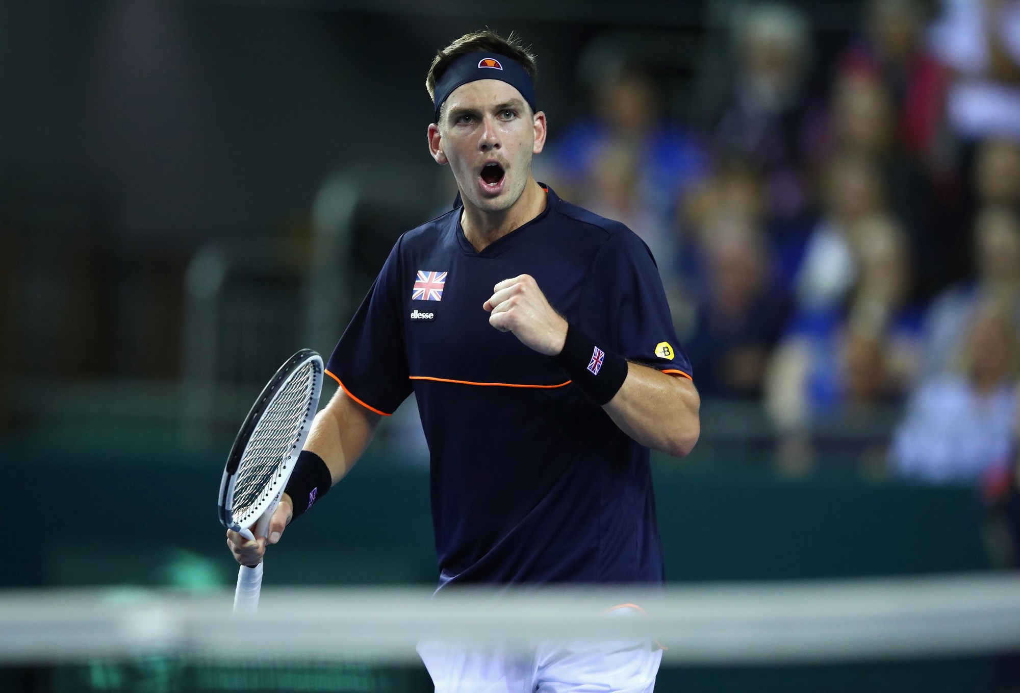 Cam Norrie fist pump after beating Sanjar Fayziev at the Davis Cup play-offs in 2018