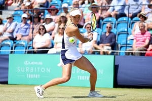 Katie Swan charging up a backhand in the quarter-finals of the Lexus Surbiton Trophy