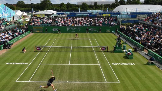 Players on grass tennis court during the Nottingham Open