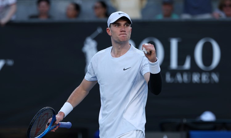 Jack Draper clenching his fist in celebration after defeating Mariano Navone in five sets in the first round at the 2025 Australian Open