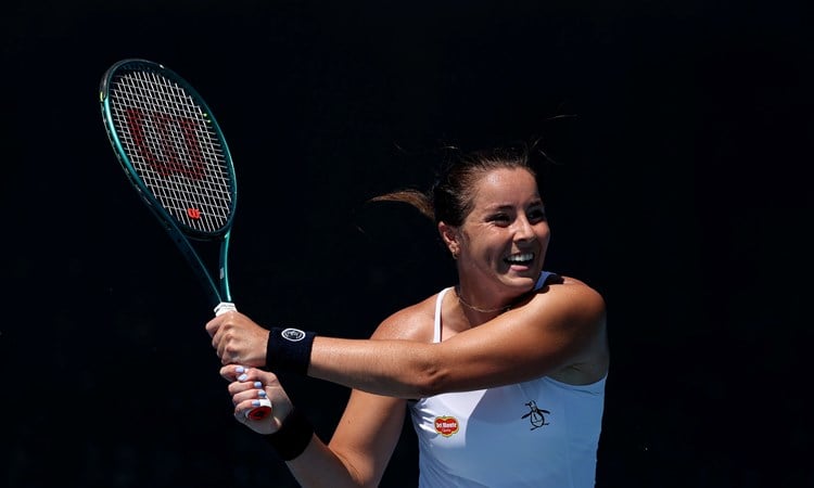 British tennis player Jodie Burrage hitting a backhand shot at the 2025 Australian Open 