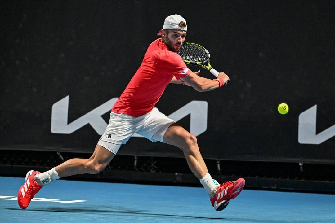 Jacob Fearnley reaches for a backhand during his second round win at the Australian Open