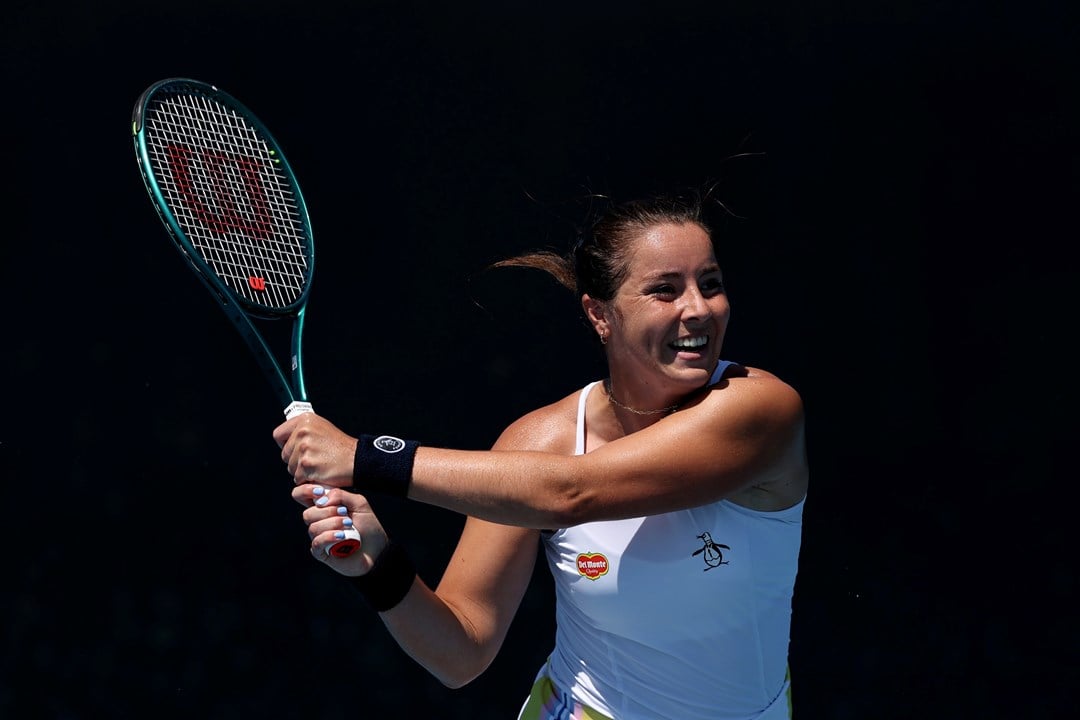 British tennis player Jodie Burrage hitting a backhand shot at the 2025 Australian Open 