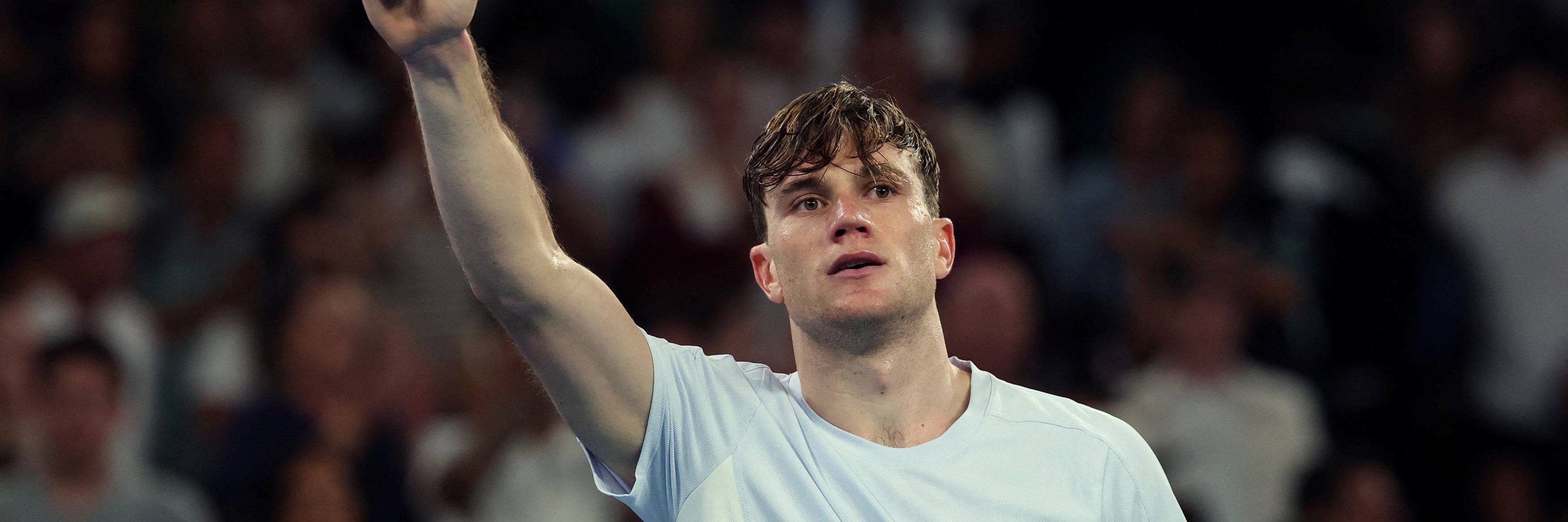 Jack Draper gives a thumbs up to the crowd after beating Thanasi Kokkinakis in the second round of the Australian Open