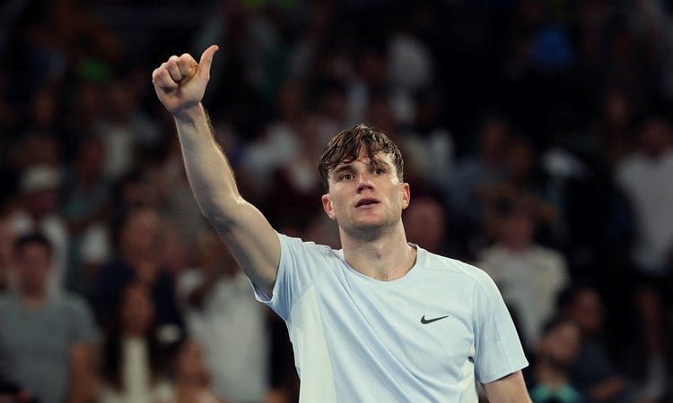 Jack Draper gives a thumbs up to the crowd after beating Thanasi Kokkinakis in the second round of the Australian Open