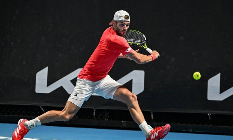 Jacob Fearnley reaches for a backhand during his second round win at the Australian Open