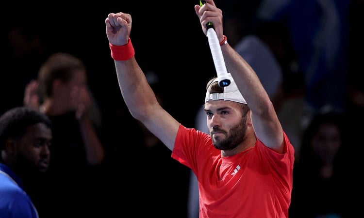 Jacob Fearnley cheers in celebration after reaching the third round of the Australian Open for the first time