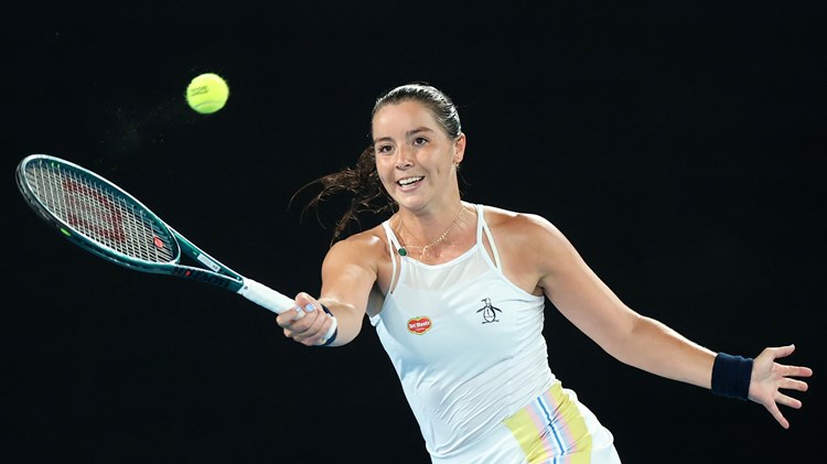 Jodie Burrage reaches for a volley against Coco Gauff at the Australian Open