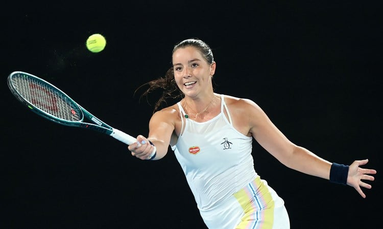 Jodie Burrage reaches for a volley against Coco Gauff at the Australian Open