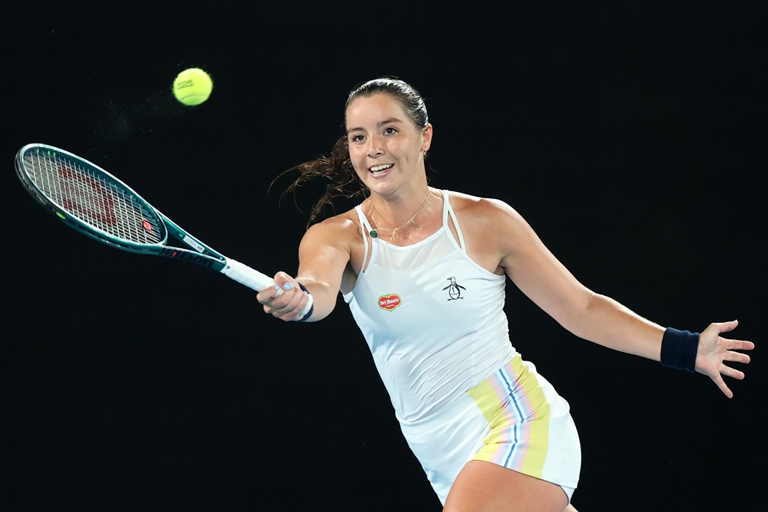 Jodie Burrage reaches for a volley against Coco Gauff at the Australian Open