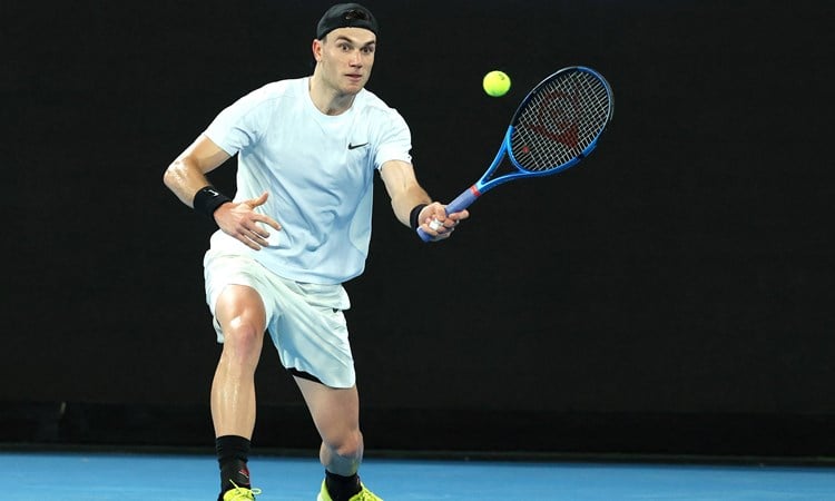 Jack Draper eyes up a forehand in the second round of the Australian Open