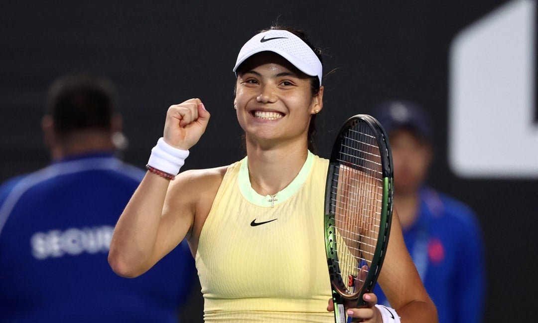 Emma Raducanu clenching her first in celebration after winning her opening round match at the Australian Open