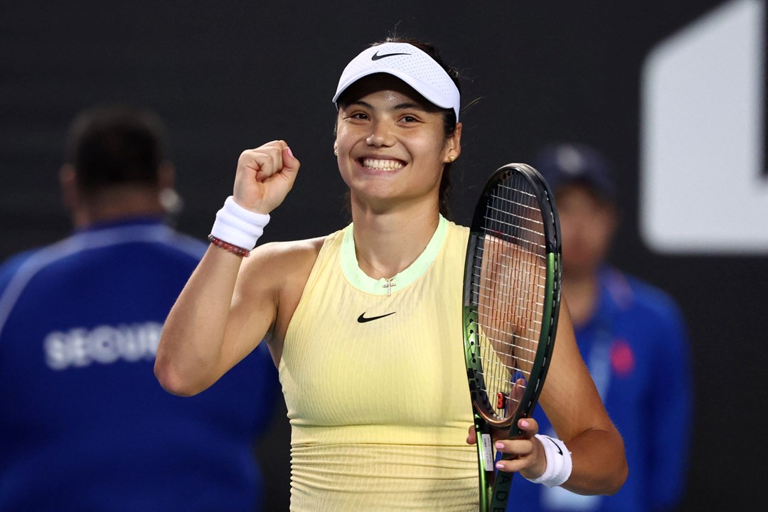 Emma Raducanu clenching her first in celebration after winning her opening round match at the Australian Open