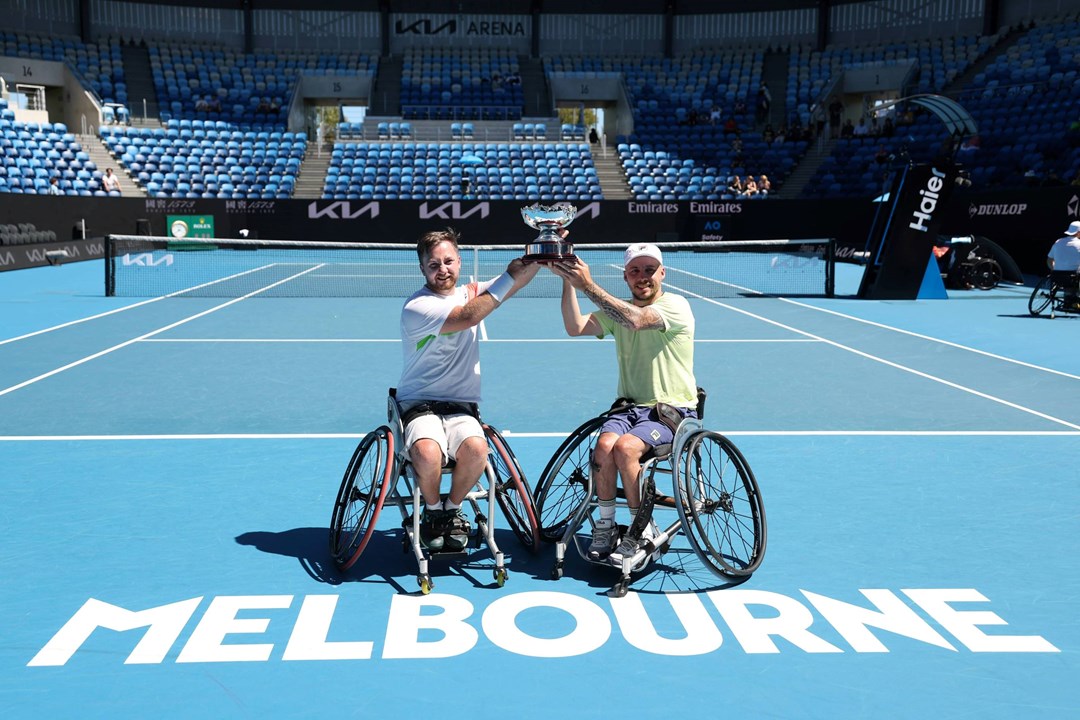 Sam Chroder and Andy Lapthorne holding the 2025 Australian Open quad doubles title