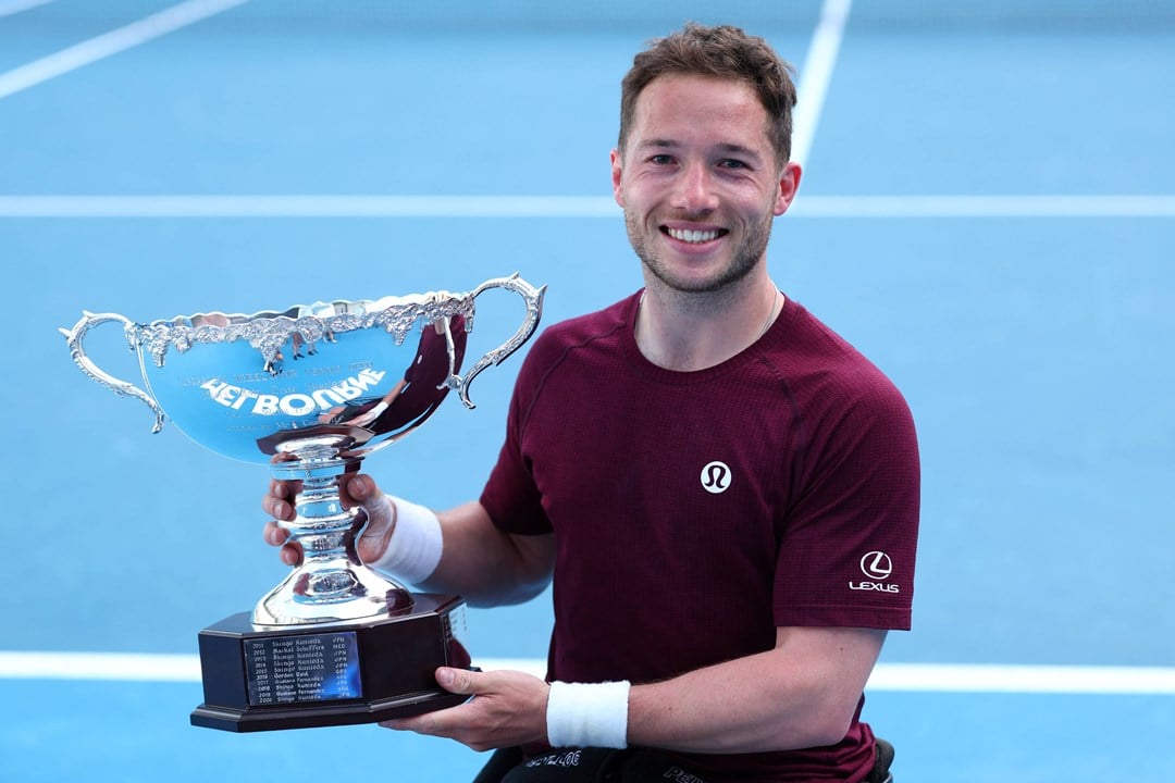 Alfie Hewett holding the 2025 Australian Open men's singles title