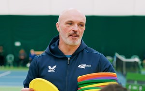 Coach, Sean Deacon setting out cones as part of a session