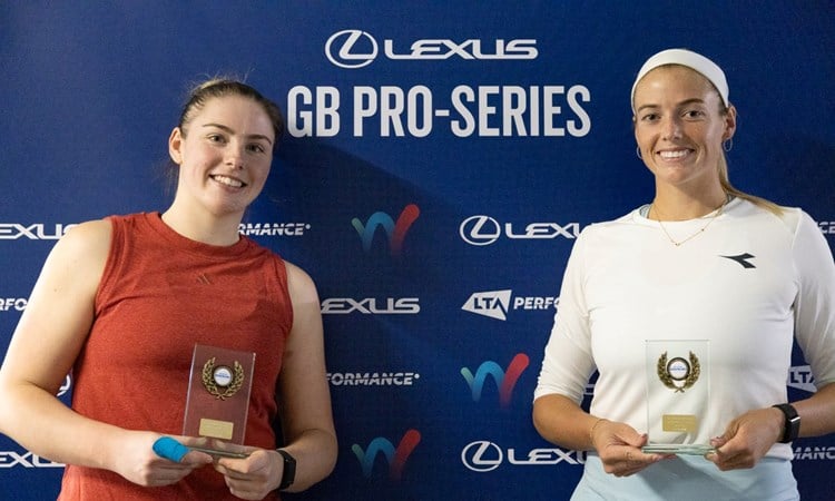 British tennis player Amelia Rajecki holding her doubles trophy at the Lexus British Pro Series Sunderland event with Anna Rogers 