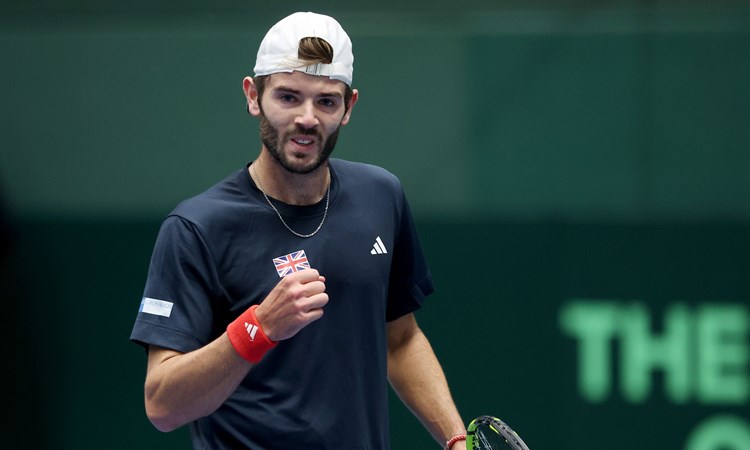 Jacob Fearnley clenching his fist in celebration in his Davis Cup debut against Japan