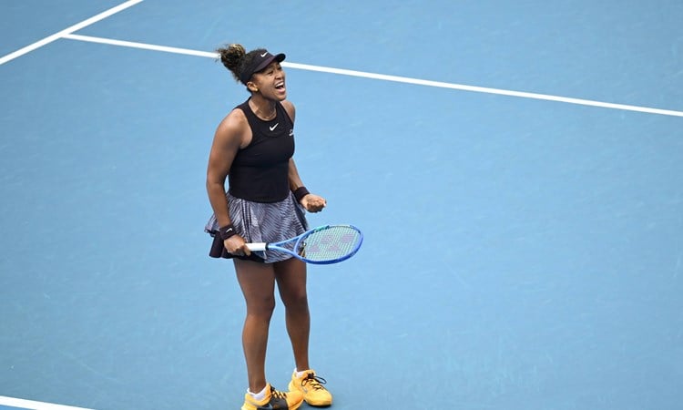 Naomi Osaka roars in celebration at the Australian Open