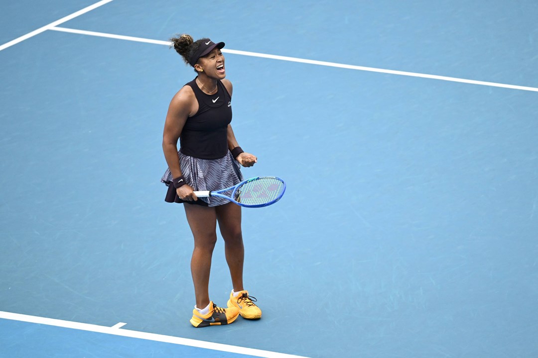 Naomi Osaka roars in celebration at the Australian Open