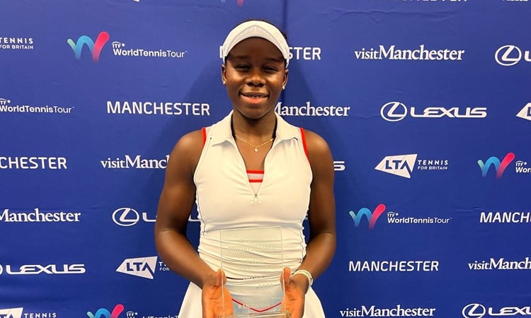 Victoria Mboku - singles champion at the Lexus GB Pro Series Manchester - holding her trophy after winning