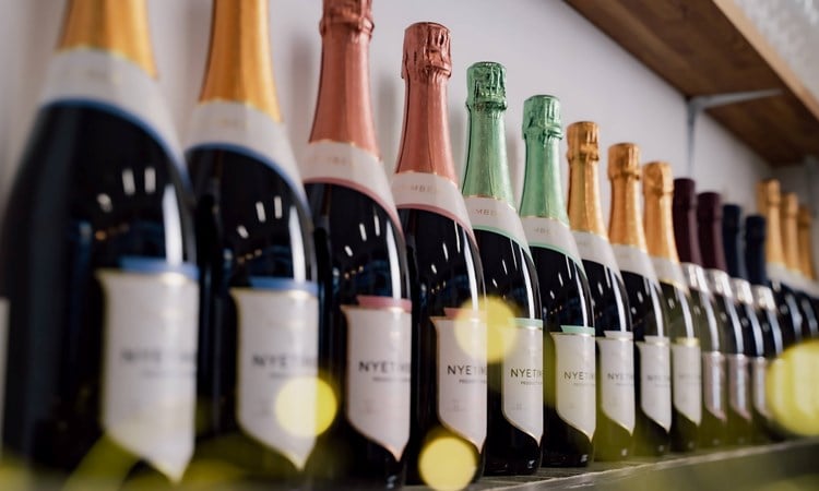 A row of Nyetimber wine bottles