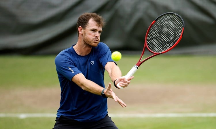 Jamie Murray hitting a volley during training at Wimbledon