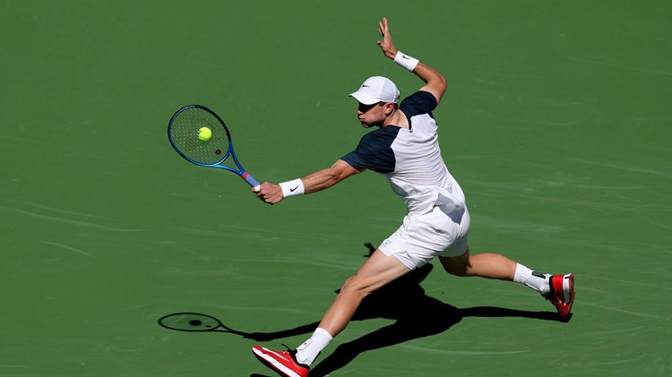 Jack Draper stretching for a backhand against Jenson Brooksby at Indian Wells