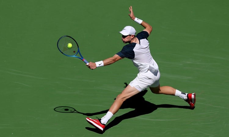 Jack Draper stretching for a backhand against Jenson Brooksby at Indian Wells