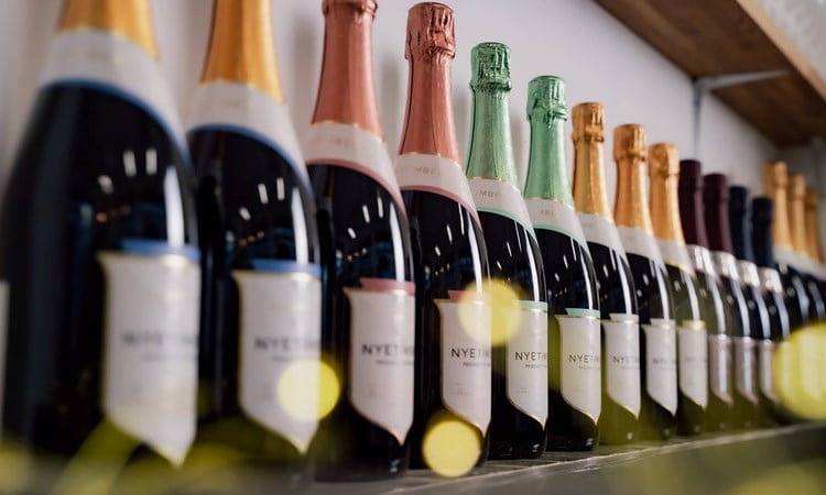 A row of Nyetimber wine bottles