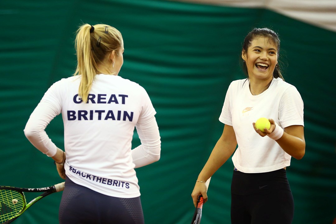 Emma Raducanu and Katie Swan joking together in training for a Billie Jean King Cup match against Slovakia in 2020