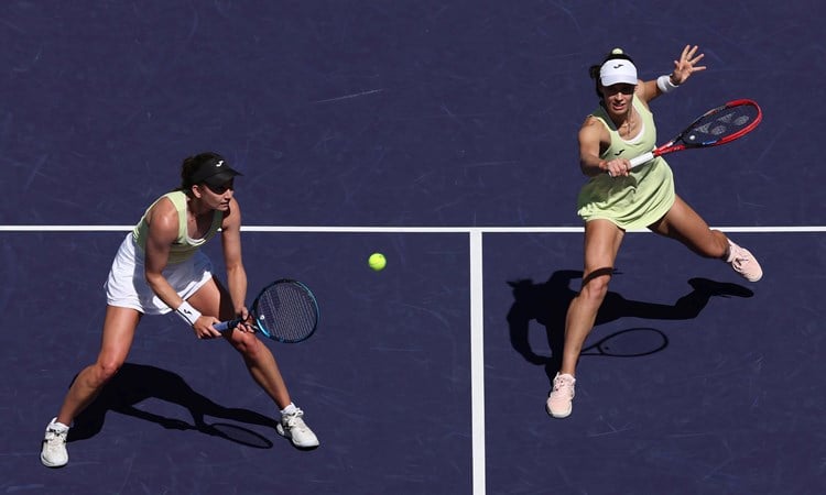 Olivia Nicholls and Tereza Mihalikova in action during the women's doubles final at Indian Wells