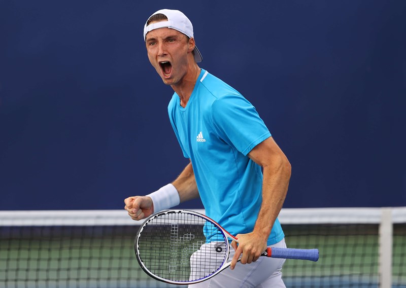 Joe Salisbury celebrating at teh Battle of the Brits at the National Tennis Centre