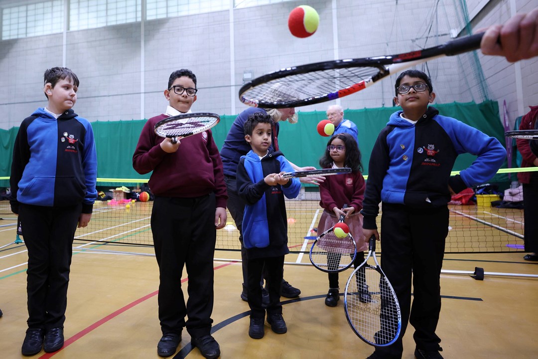 Group of kids playing at a Deaf Tennis Festival