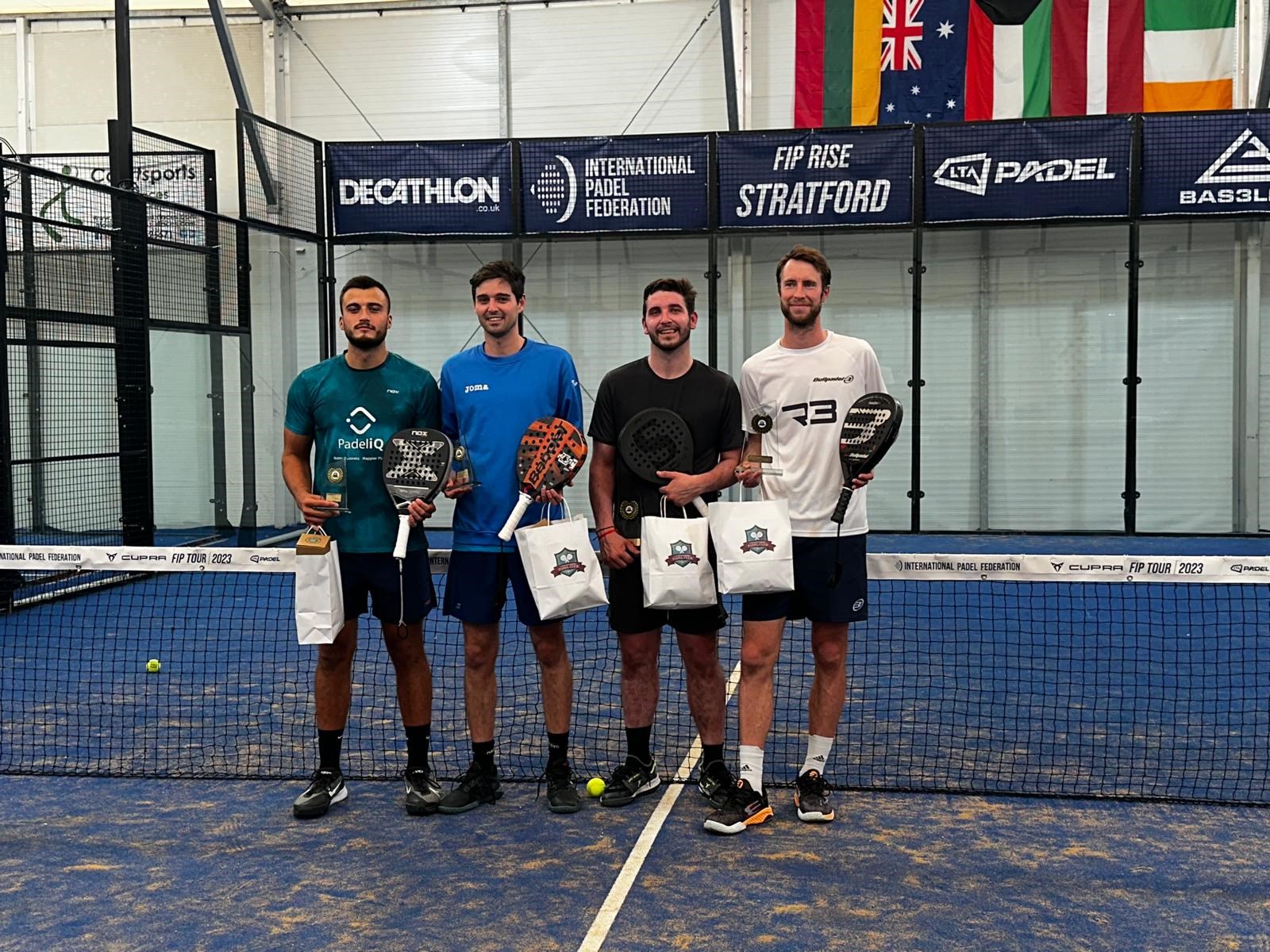 Louie Harris, Rafael Vega Otalaurruchi, Alfonso Patacho and Chris Salisbury on court holding their padel bats and trophies at the FIP Rise Stratford event