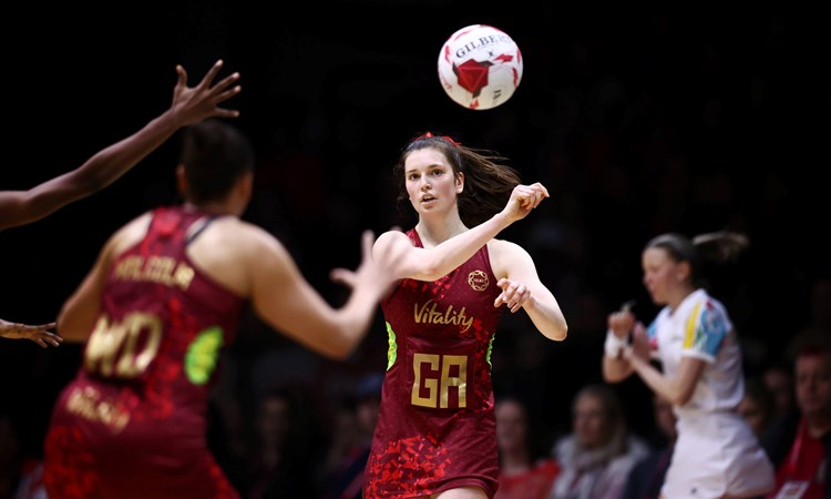 Sophie Drakeford Lewis playing netball for England
