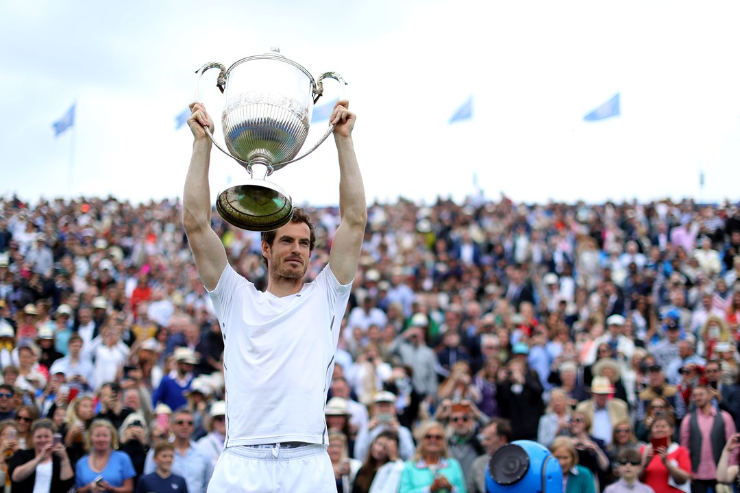 Andy Murray lifts the trophy after being crowned champion of the Queen's Championships in 2016