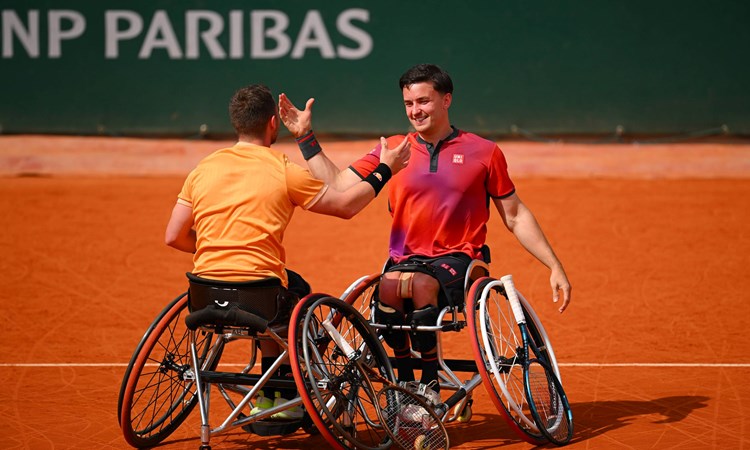 Gordon Reid and Alfie Hewett on court playing doubles in Rome