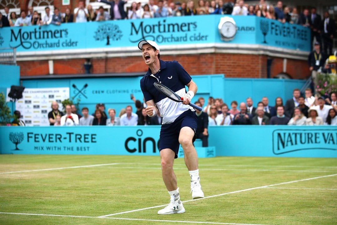 Andy Murray celebrates winning the doubles at the 2019 Queen's Club Championships