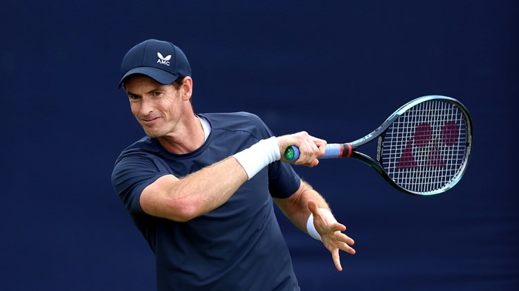 Andy Murray mid-motion hitting a forehand on court at the cinch Championships