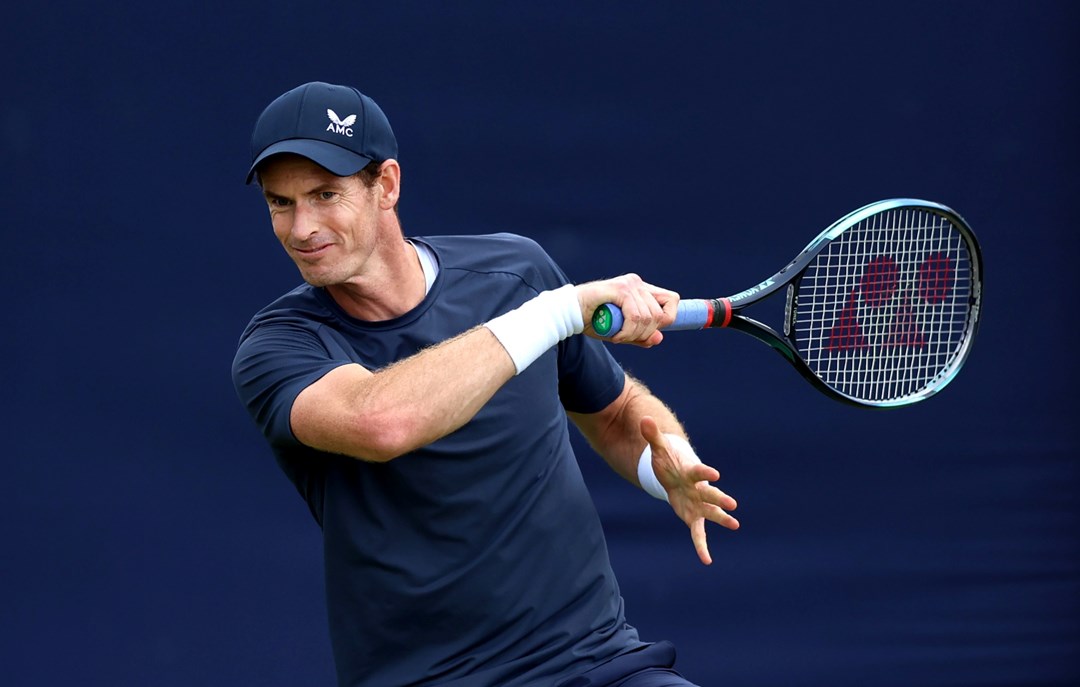 Andy Murray mid-motion hitting a forehand on court at the cinch Championships