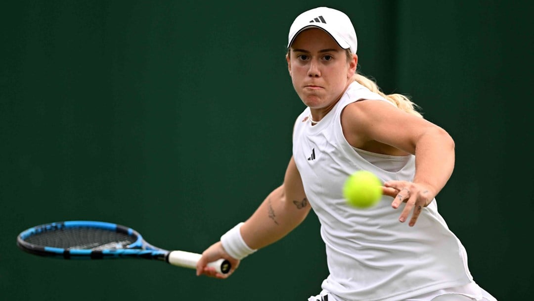 Sonay Kartal preparing to hit a forehand on court at Wimbledon during the first round