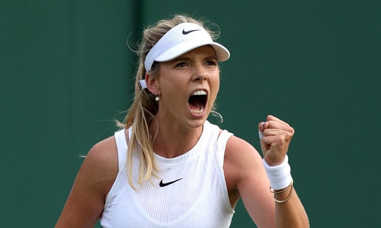 Katie Boulter gives a fist pump in celevration during a first round win at Wimbledon