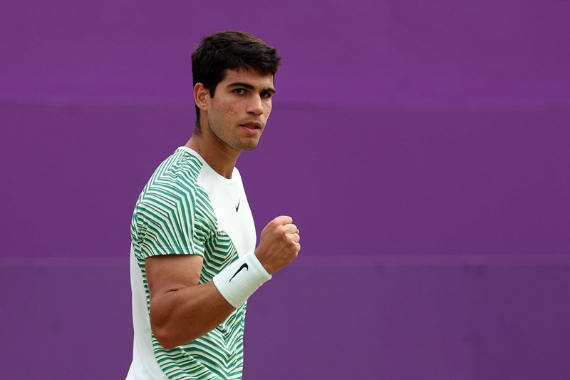 Carlos Alcaraz clenching his fist in celebration after winning his semi-final match against Sebastian Korda