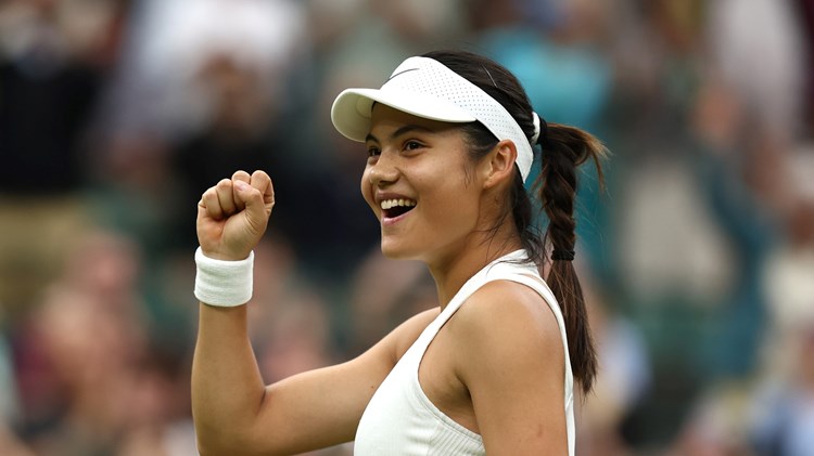 Emma Raducanu smiles after a second round win over Elise Mertens at Wimbledon