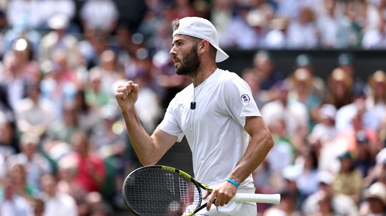Jacob Fearnley of Great Britain celebrates as he plays against Novak Djokovic of Serbia in his Gentlemen's Singles second round match during day four of The Championships Wimbledon 2024 at All England Lawn Tennis and Croquet Club on July 04, 2024 in London, England.