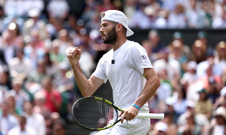 Jacob Fearnley of Great Britain celebrates as he plays against Novak Djokovic of Serbia in his Gentlemen's Singles second round match during day four of The Championships Wimbledon 2024 at All England Lawn Tennis and Croquet Club on July 04, 2024 in London, England.