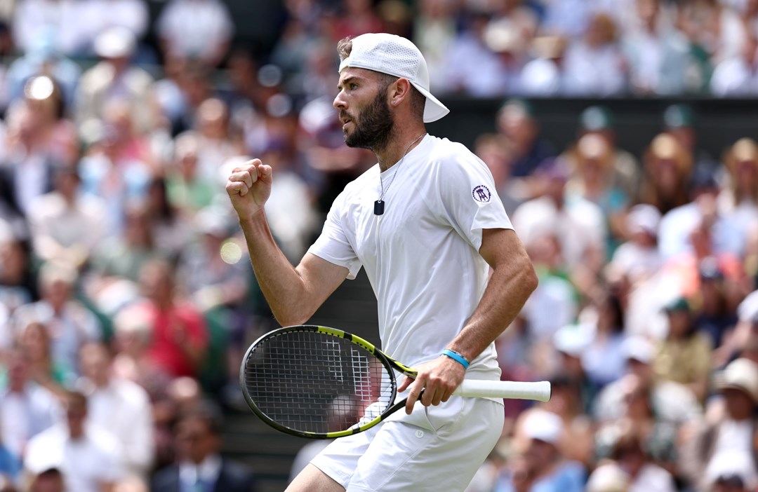 Jacob Fearnley of Great Britain celebrates as he plays against Novak Djokovic of Serbia in his Gentlemen's Singles second round match during day four of The Championships Wimbledon 2024 at All England Lawn Tennis and Croquet Club on July 04, 2024 in London, England.