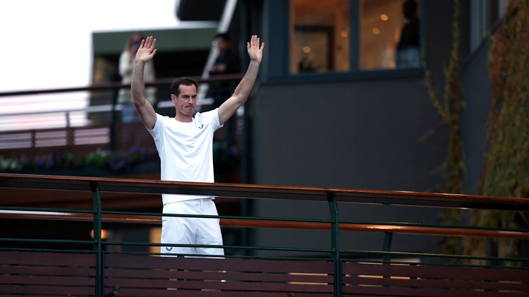 Andy Murray waves to the crowds at Wimbledon