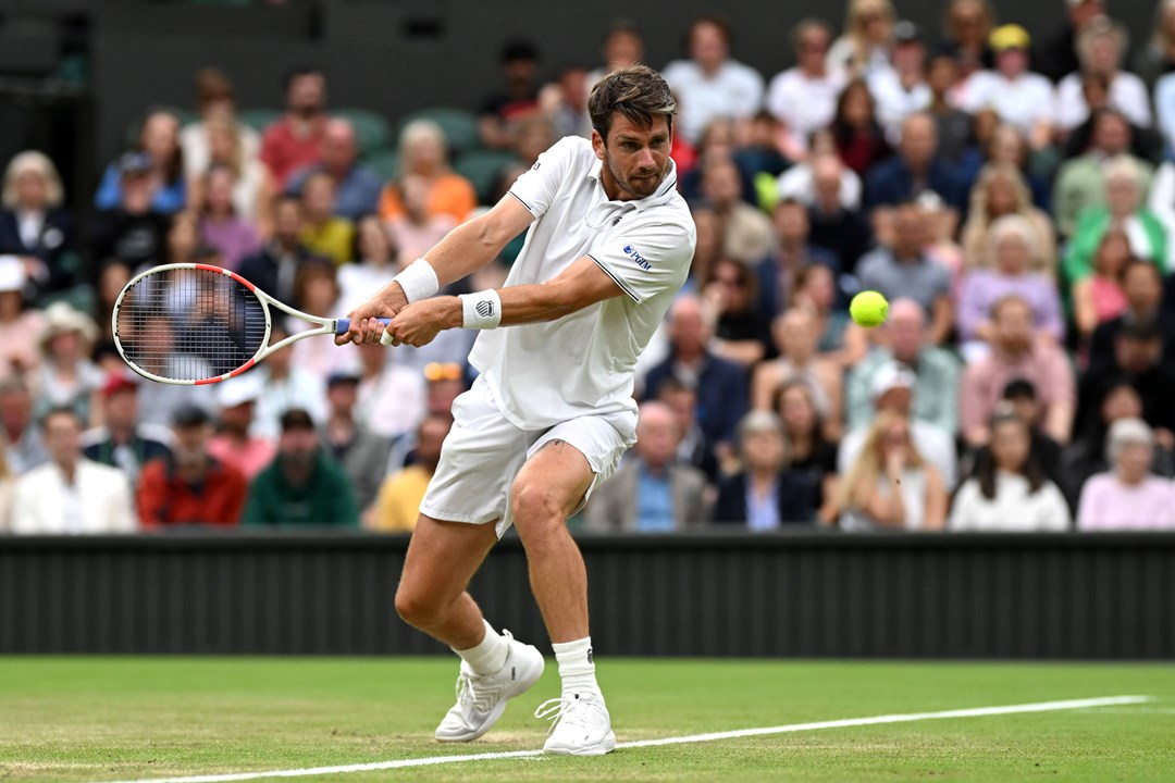 Cam Norrie lines up a backhand in the third roud of Wimbledon